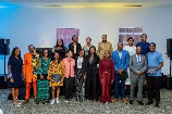 Lead image: the full cohort on stage